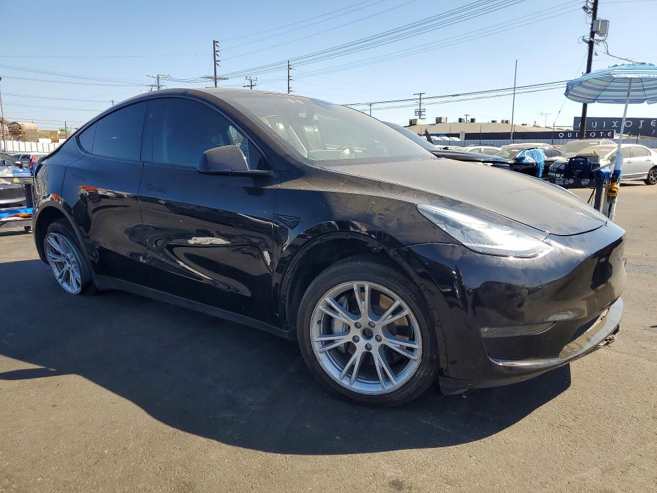 2023 Tesla VIN 7SAYGDEE4PA156824 COPART salvage auction — SIDE, Ca - Salvage Certificate, sold $7,700 on 2026-07-27 (photo 4)
