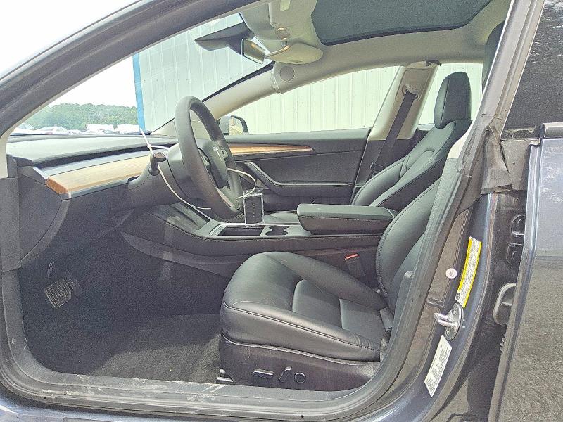 2023 Tesla Model 3 VIN 5YJ3E1EA5PF491330 COPART salvage auction — SIDE, GA - CERTIFICATE OF TITLE (P), sold $7,700 on 2026-07-16 (photo 7)
