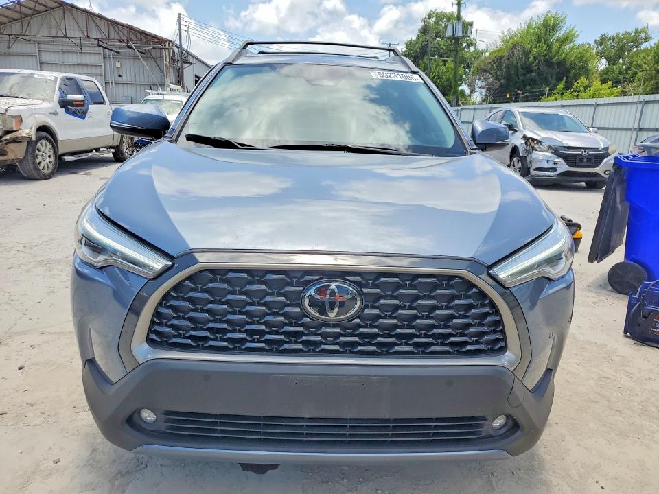 2024 Toyota Corolla cross VIN 7MUDAABG7RV080654 COPART salvage auction — SIDE, TX - SALVAGE VEHICLE TITLE, sold $11,600 on 2026-08-25 (photo 5)