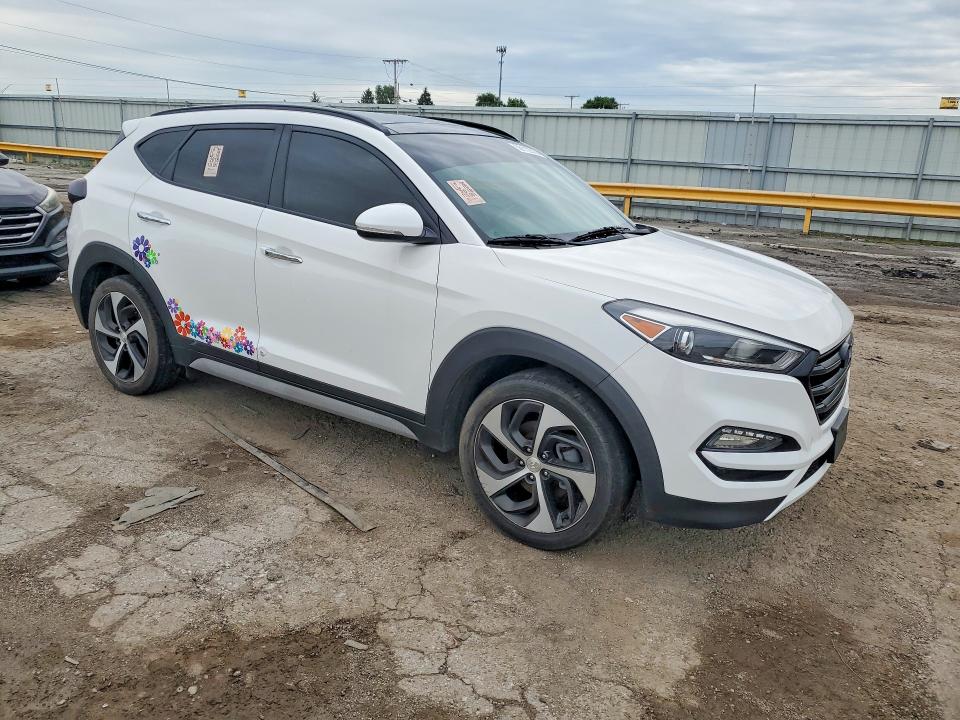 2018 Hyundai Tucson VIN KM8J33A2XJU802493 COPART salvage auction — MINOR DENT/SCRATCHES, Il - Certificate Of Title (P), sold $6,500 on 2026-07-23 (photo 4)