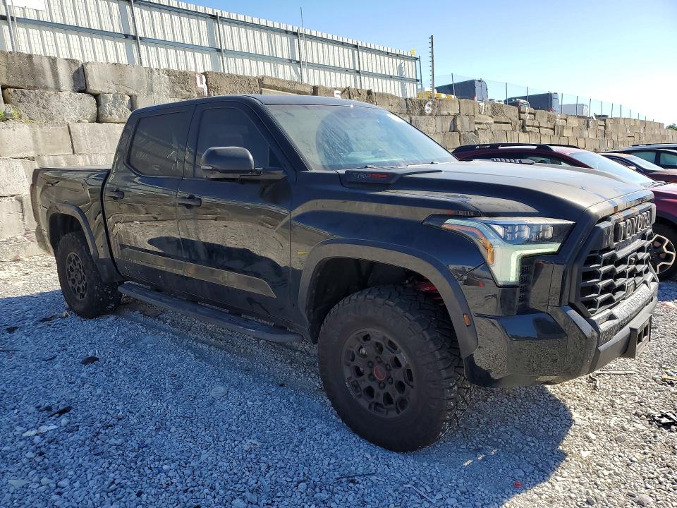 2025 Toyota Tundra VIN 5TFPC5DBXSX093425 COPART salvage auction — BURN, TX - SALVAGE VEHICLE TITLE, sold $47,500 on 2026-08-21 (photo 4)
