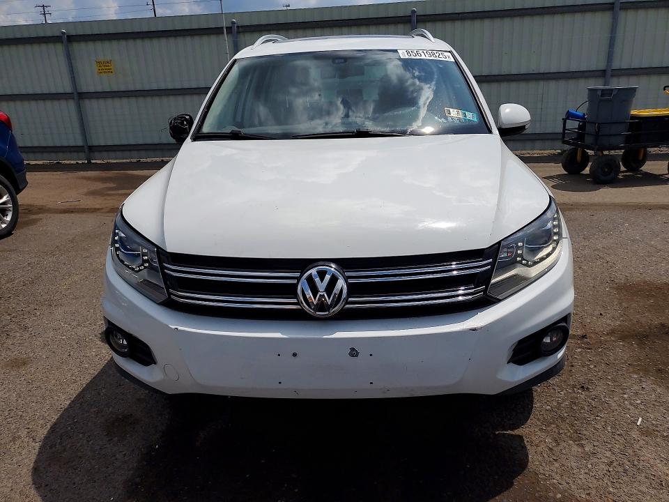 2016 Volkswagen Tiguan VIN WVGAV7AX7GW564189 COPART salvage auction — WATER/FLOOD, Pa - Cert Of Title, sold $1,200 on 2026-07-10 (photo 5)