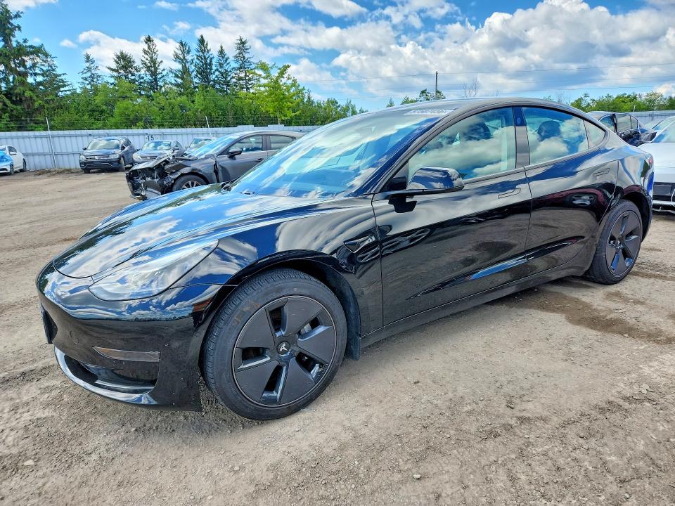 2021 Tesla Model 3 VIN 5YJ3E1EA2MF962443 COPART salvage auction — SIDE, On - Permit No Brand - Unfit, sold $9,400 on 2026-07-07 (photo 1)