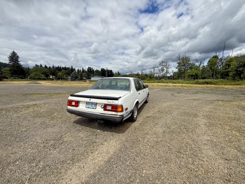 1985 BMW 7 series VIN WBAFJ910608751757 COPART salvage auction — MINOR DENT/SCRATCHES, Or - Certificate Of Title (P), sold $5,800 on 2026-07-13 (photo 4)