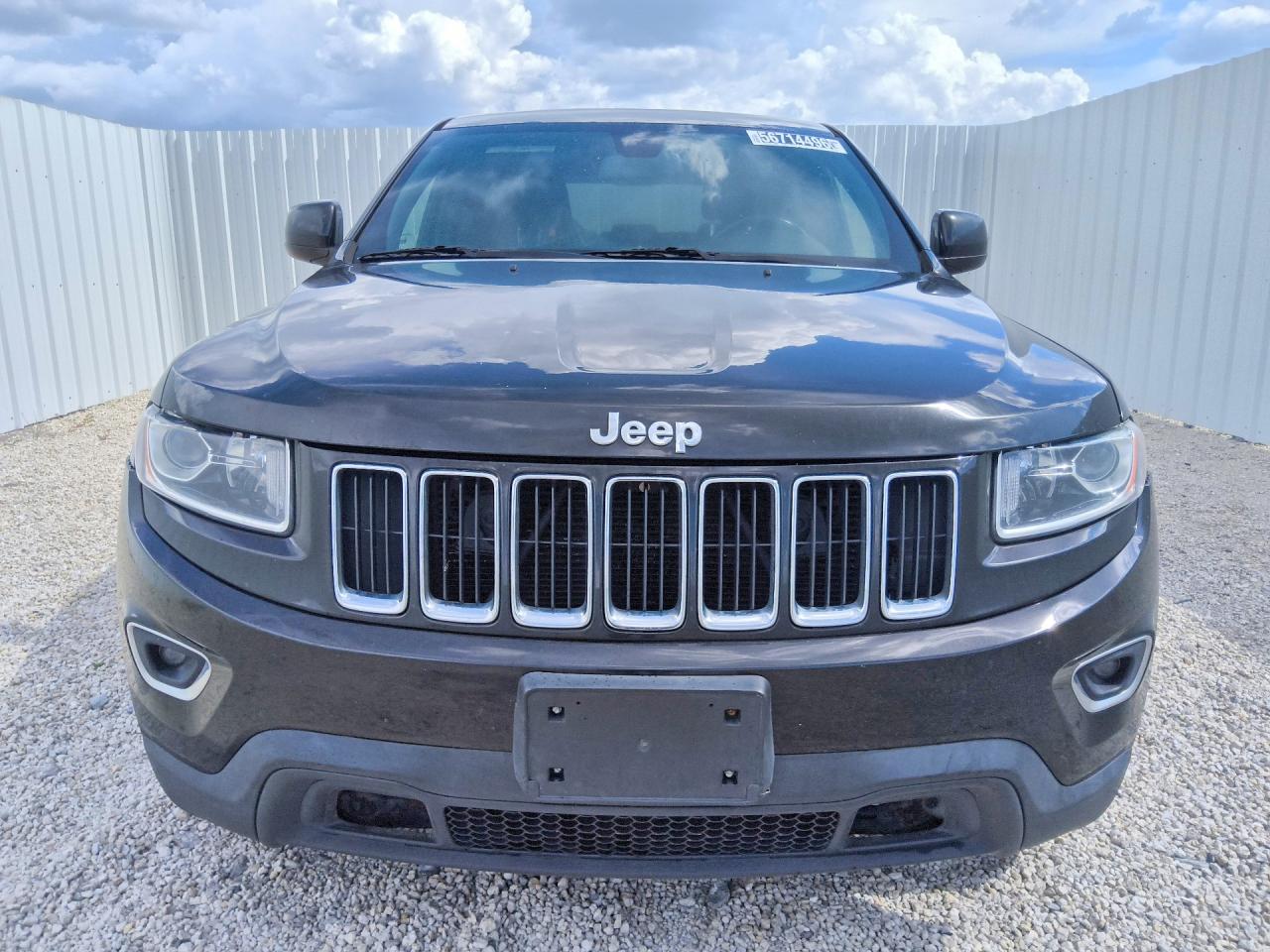 2015 Jeep Grand Cherokee VIN 1C4RJFAG4FC833391 COPART salvage auction — Normal Wear, FL - CERTIFICATE OF TITLE, sold $400 on 2026-07-09 (photo 5)