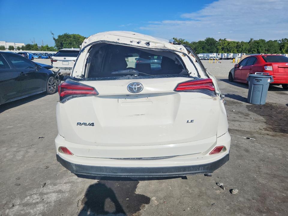 2016 Toyota Rav 4 VIN JTMZFREV6GJ094856 COPART salvage auction — ROLLOVER, Fl - Certificate Of Title, sold $2,450 on 2026-07-27 (photo 6)