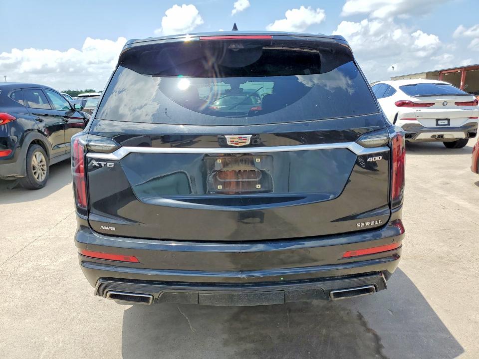 2023 Cadillac Xt6 VIN 1GYKPGRS0PZ141748 COPART salvage auction — WATER/FLOOD, Salvage Title, sold $9,000 on 2026-07-30 (photo 6)