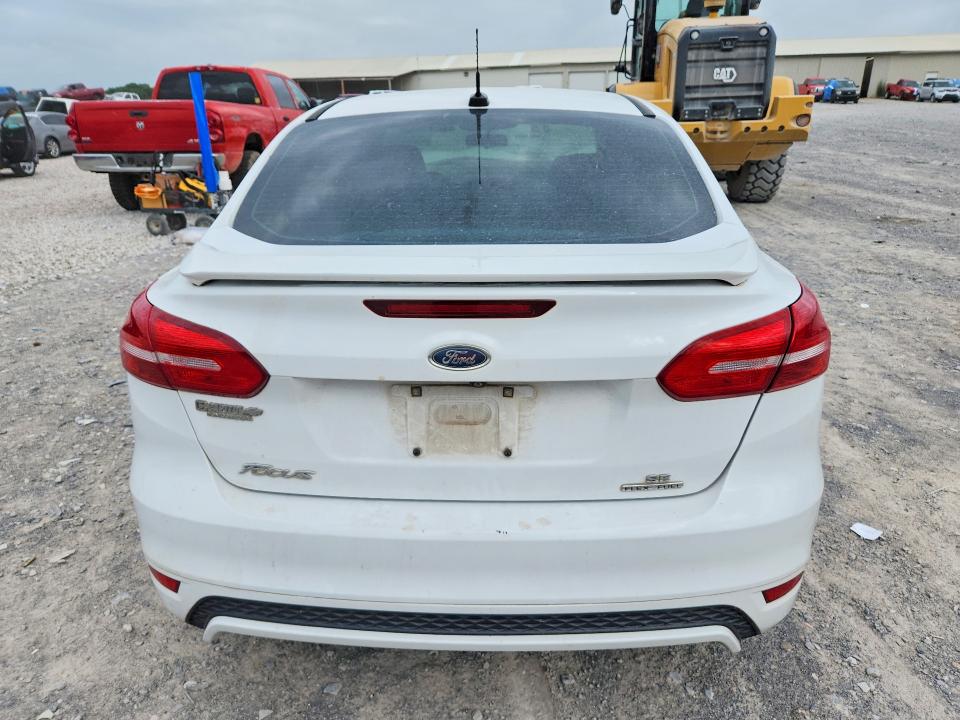 2016 Ford Focus VIN 1FADP3F29GL273881 COPART salvage auction — FRONT END, Tn - Salvage Certificate, sold $500 on 2026-07-02 (photo 6)