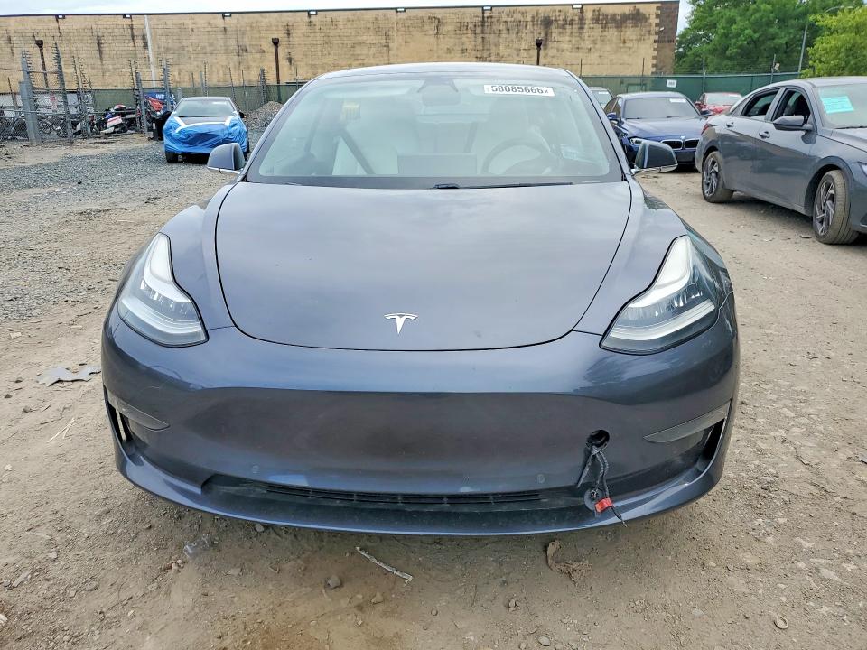 2019 Tesla Model 3 VIN 5YJ3E1EA5KF407662 COPART salvage auction — MECHANICAL, Wv - Certificate Of Title (P), sold $5,700 on 2026-07-07 (photo 5)