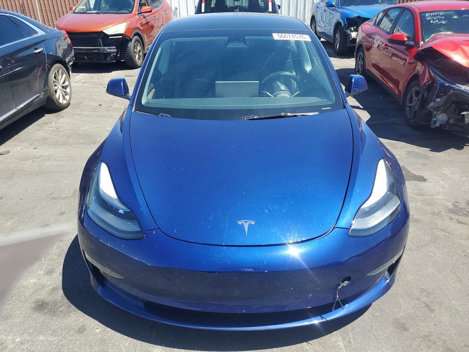 2023 Tesla Model 3 VIN 5YJ3E1EA9PF677632 COPART salvage auction — SIDE, Nv - Salvage Title, sold $8,200 on 2026-07-15 (photo 5)