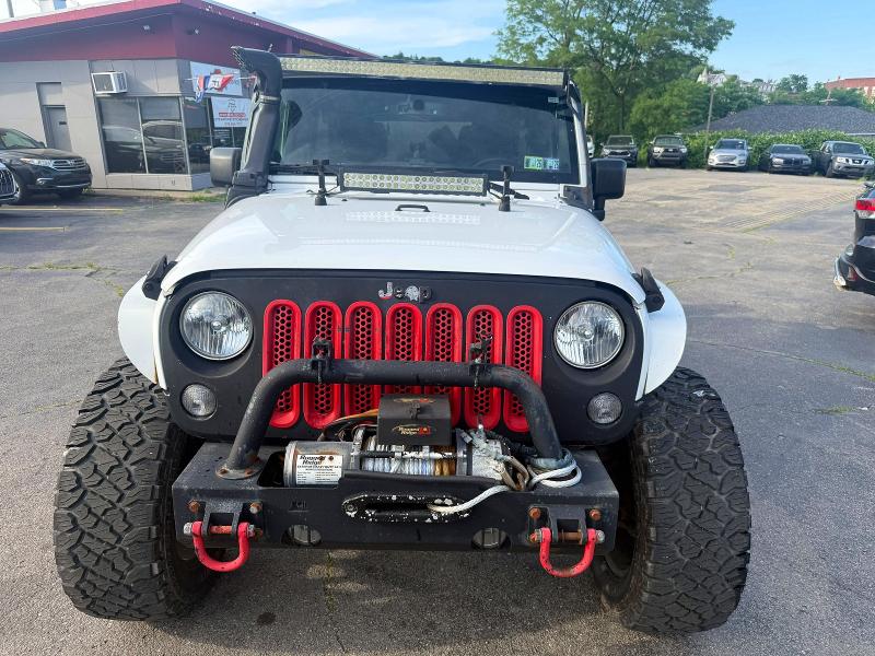 2014 Jeep Wrangler / VIN 1C4BJWDG7EL203909 COPART salvage auction — MINOR DENT/SCRATCHES, In - Certificate Of Title (P), sold $10,700 on 2026-07-29 (photo 5)