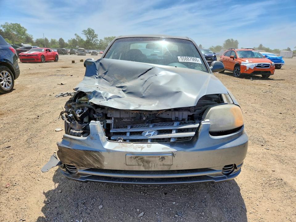2004 Hyundai Accent VIN KMHCG45C04U572411 COPART salvage auction — FRONT END, Il - Salvage Certificate, sold $275 on 2026-07-14 (photo 5)