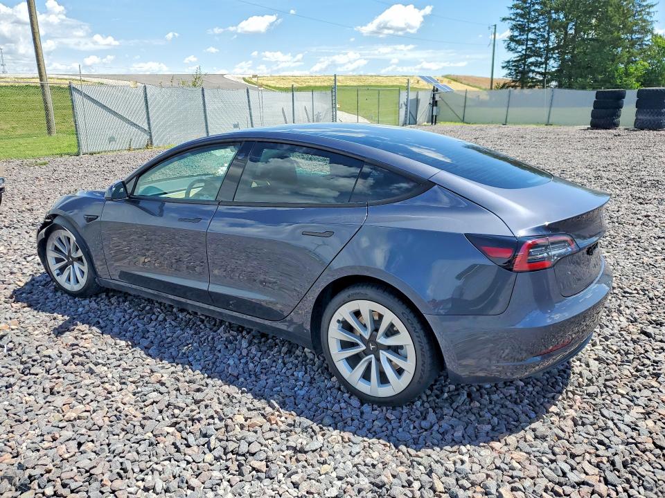 2021 Tesla Model 3 VIN 5YJ3E1EB0MF983543 COPART salvage auction — SIDE, In - Cert Of Title-Salvage Title, sold $4,600 on 2026-07-28 (photo 2)