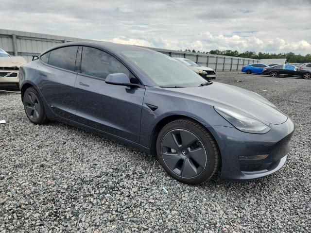 2022 Tesla VIN 5YJ3E1EA5NF330893 COPART salvage auction — REAR END, Fl - Cert Of Title Slvg Rebuildable, sold $5,300 on 2026-07-10 (photo 4)