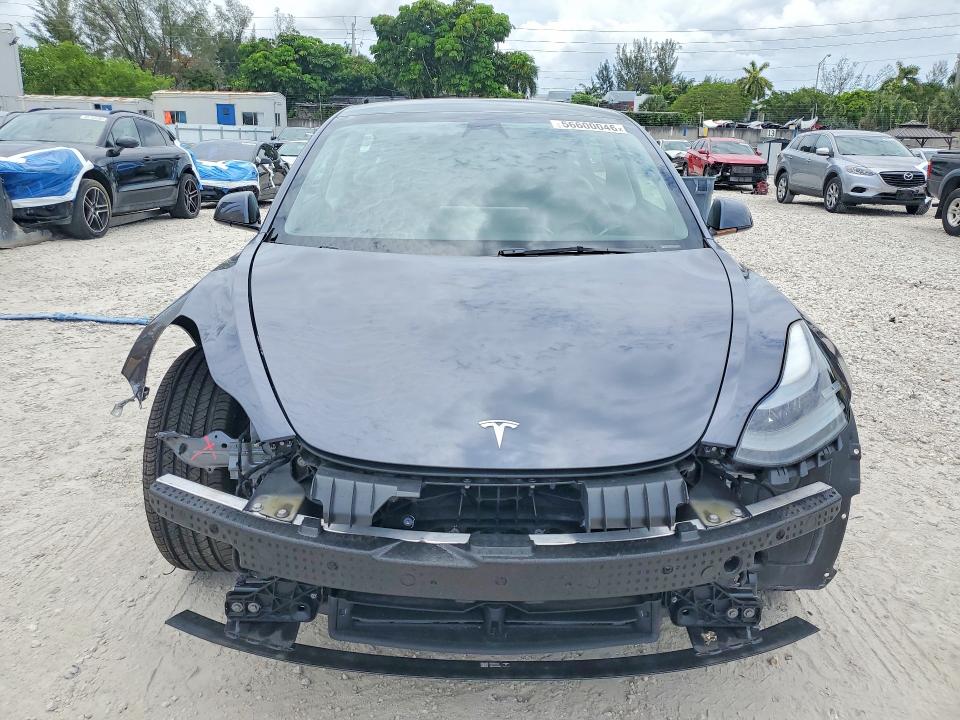 2023 Tesla Model 3 VIN 5YJ3E1EA6PF671061 COPART salvage auction — FRONT END, Fl - Cert Of Title Slvg Rebuildable, sold $10,200 on 2026-07-07 (photo 5)