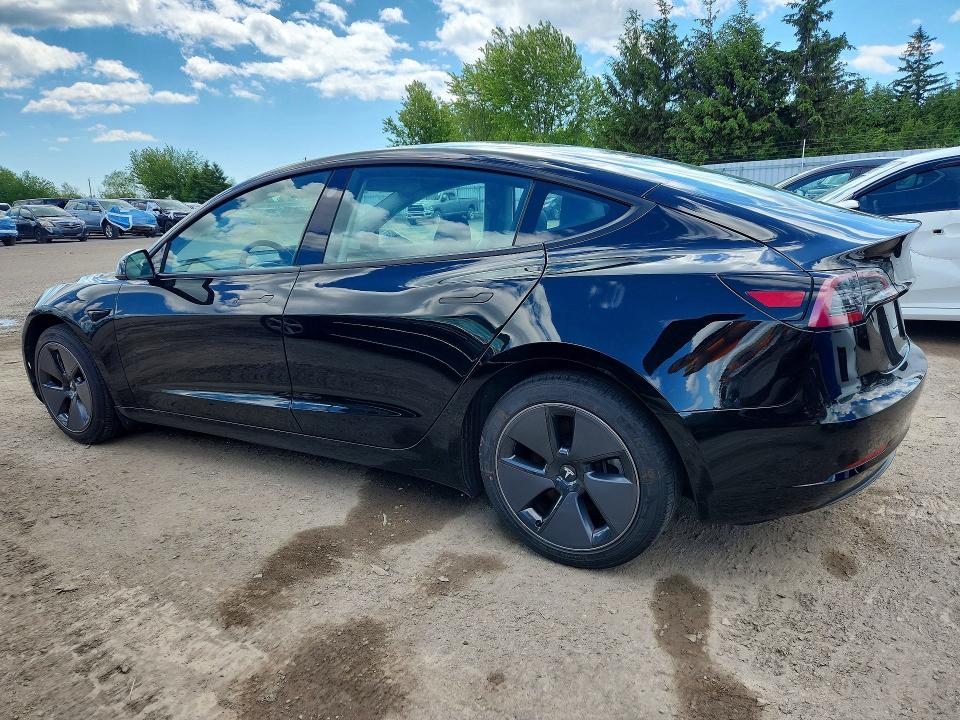 2021 Tesla Model 3 VIN 5YJ3E1EA2MF962443 COPART salvage auction — SIDE, On - Permit No Brand - Unfit, sold $9,400 on 2026-07-07 (photo 2)