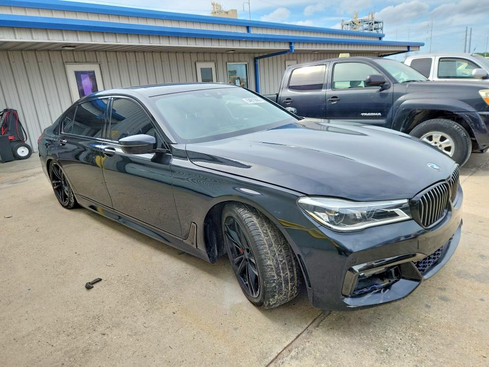 2017 BMW 7er VIN WBA7F0C5XHGM21065 COPART salvage auction — MINOR DENT/SCRATCHES, La - Cert Of Title-Salvage, sold $5,000 on 2026-08-12 (photo 4)