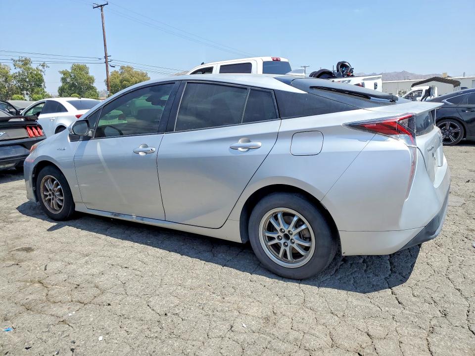 2017 Toyota Prius VIN JTDKBRFUXH3032398 COPART salvage auction — SIDE, Tx - Dis/Dlr/Exp Only Clean Title, sold $5,500 on 2026-07-13 (photo 2)