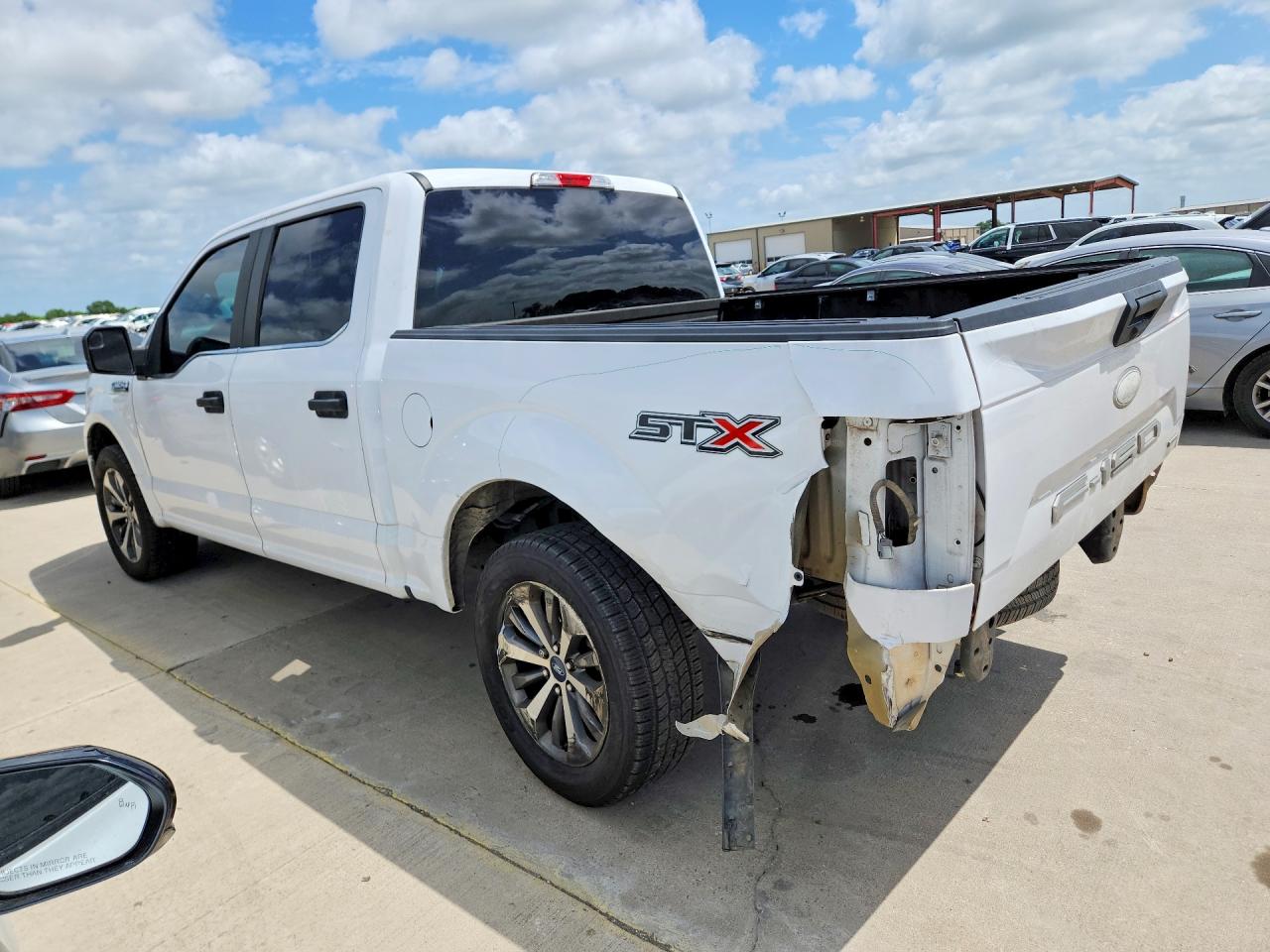 2020 Ford F-150 Lightning VIN 1FTEW1CP7LKE85975 COPART salvage auction — Rear End, TX - SALVAGE VEHICLE TITLE, sold $8,300 on 2026-07-09 (photo 2)
