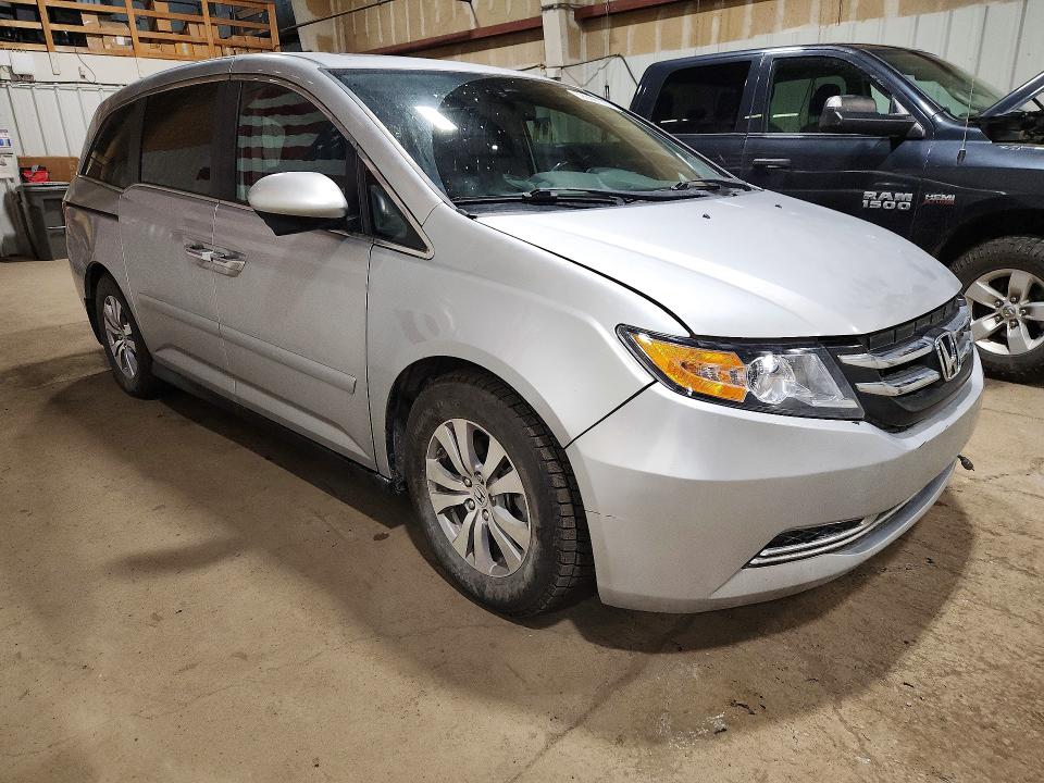 2014 Honda Odyssey VIN 5FNRL5H64EB080237 COPART salvage auction — FRONT END, AK - CERT OF VEH TITLE-RECONSTRUCTE, sold $750 on 2026-07-21 (photo 4)
