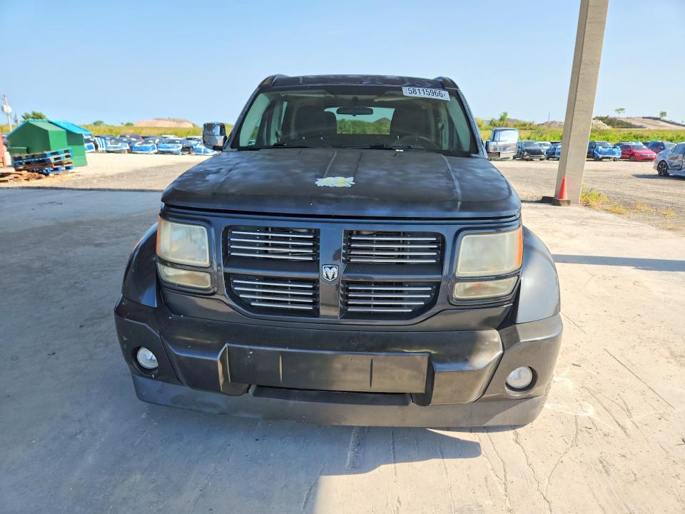 2011 Dodge VIN 1D4PU4GK4BW590627 COPART salvage auction — REAR END, FL - CERT OF TITLE SLVG REBUILDABLE, sold $350 on 2026-07-02 (photo 5)