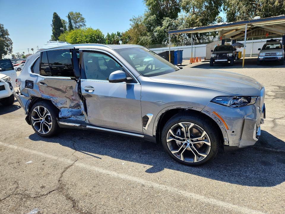 2026 BMW VIN 5UX13EU01T9319926 COPART salvage auction — SIDE, CA - SALVAGE CERTIFICATE, sold $23,100 on 2026-07-24 (photo 4)