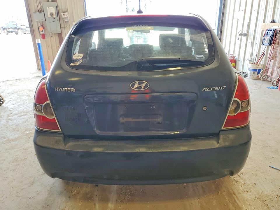 2011 Hyundai Accent VIN KMHCM3AC8BU197969 COPART salvage auction — HAIL, Tx - Cert Of Title-Rebuilt Salvage, sold $350 on 2026-07-17 (photo 6)