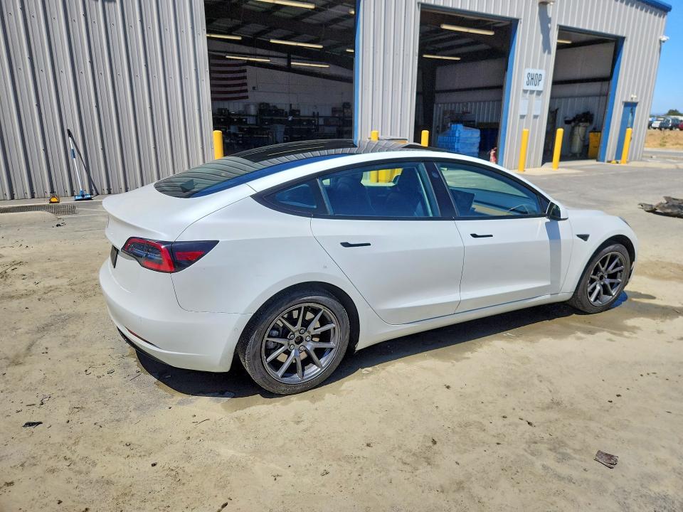 2022 Tesla Model 3 VIN 5YJ3E1EA0NF371867 COPART salvage auction — MECHANICAL, Ca - Certificate Of Title, sold $9,600 on 2026-07-08 (photo 3)