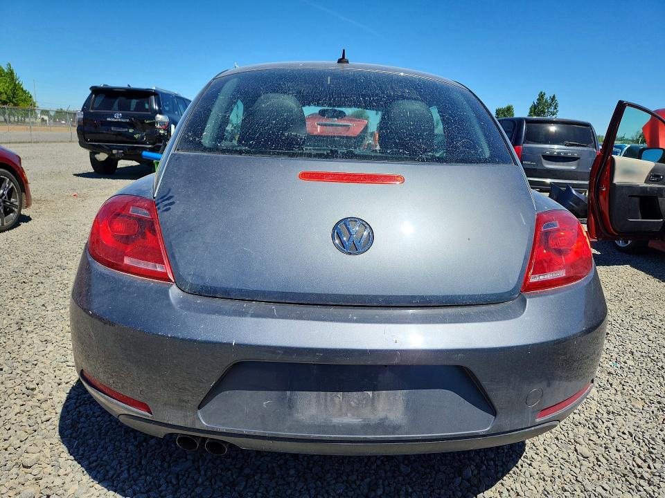 2012 Volkswagen Beetle VIN 3VWJP7AT5CM614980 COPART salvage auction — MINOR DENT/SCRATCHES, Or - Salvage Title Certificate, sold $2,100 on 2026-08-04 (photo 6)