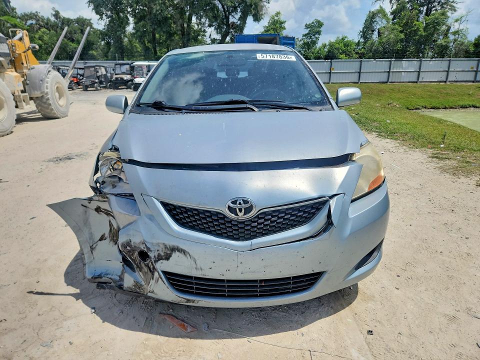 2009 Toyota Yaris VIN JTDBT903991305695 COPART salvage auction — FRONT END, FL - CERT OF TITLE SLVG REBUILDABLE, sold $275 on 2026-07-21 (photo 5)