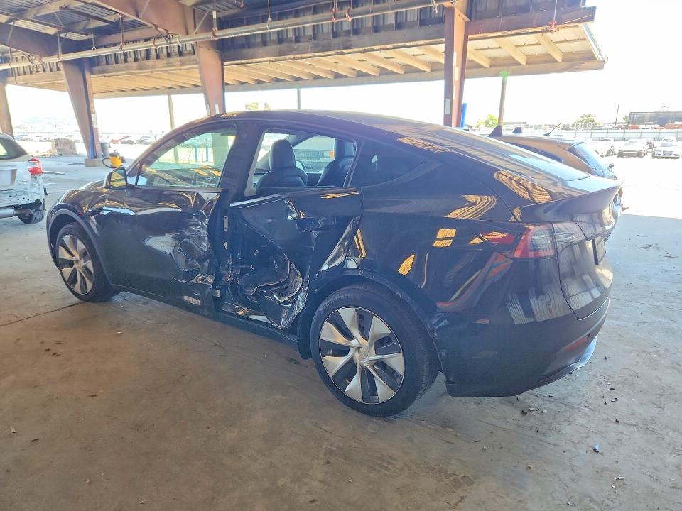 2021 Tesla Model y VIN 5YJYGAEE0MF154899 COPART salvage auction — SIDE, CA - SALVAGE CERTIFICATE, sold $9,000 on 2026-07-13 (photo 2)