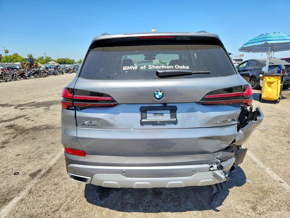 2026 BMW VIN 5UX13EU01T9319926 COPART salvage auction — SIDE, CA - SALVAGE CERTIFICATE, sold $23,100 on 2026-07-24 (photo 6)