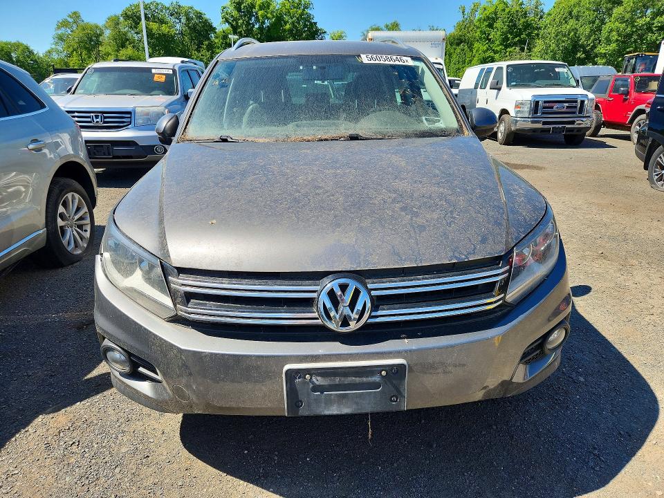 2012 Volkswagen Tiguan VIN WVGBV7AX1CW005705 COPART salvage auction — MINOR DENT/SCRATCHES, Ny - Certificate Of Title, sold $3,500 on 2026-07-09 (photo 5)