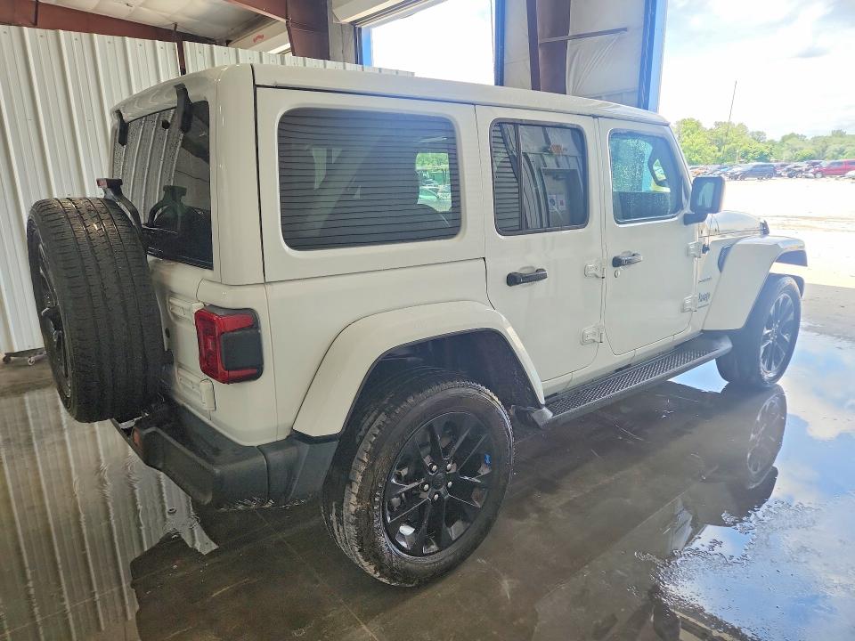 2023 Jeep Wrangler / VIN 1C4JJXP60PW556028 COPART salvage auction — NORMAL WEAR, Il - Certificate Of Title, sold $9,900 on 2026-07-09 (photo 3)