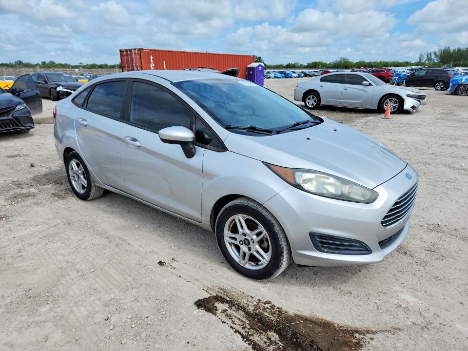 2011 Ford Fiesta VIN 3FADP4BJ8HM140841 COPART salvage auction — MINOR DENT/SCRATCHES, Fl - Certificate Of Title, sold $525 on 2026-07-25 (photo 4)