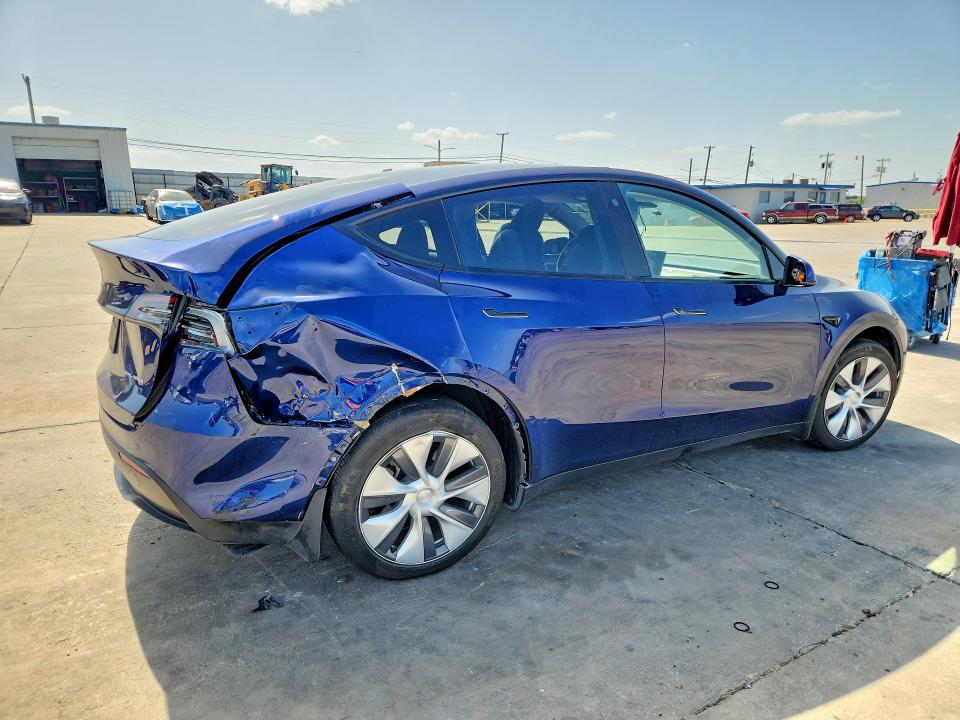 2023 Tesla Model y VIN 7SAYGDEEXPA064469 COPART salvage auction — SIDE, TX - SALVAGE VEHICLE TITLE (P), sold $5,900 on 2026-07-16 (photo 3)