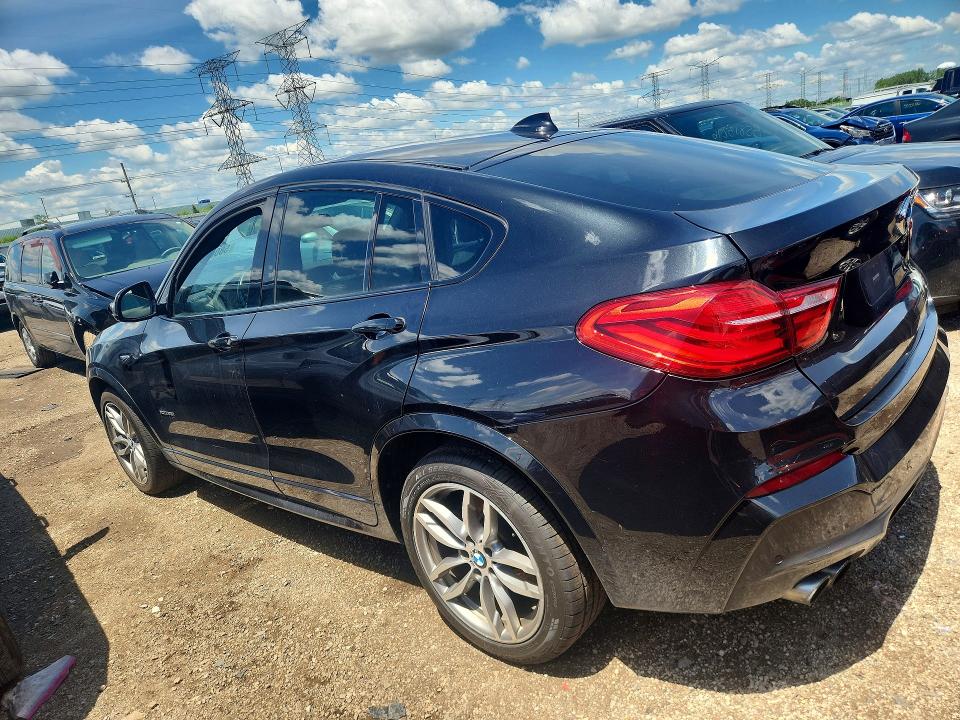 2015 BMW X4 VIN 5UXXW3C54F0M87359 COPART salvage auction — NORMAL WEAR, IL - CERTIFICATE OF TITLE, sold $850 on 2026-07-28 (photo 2)