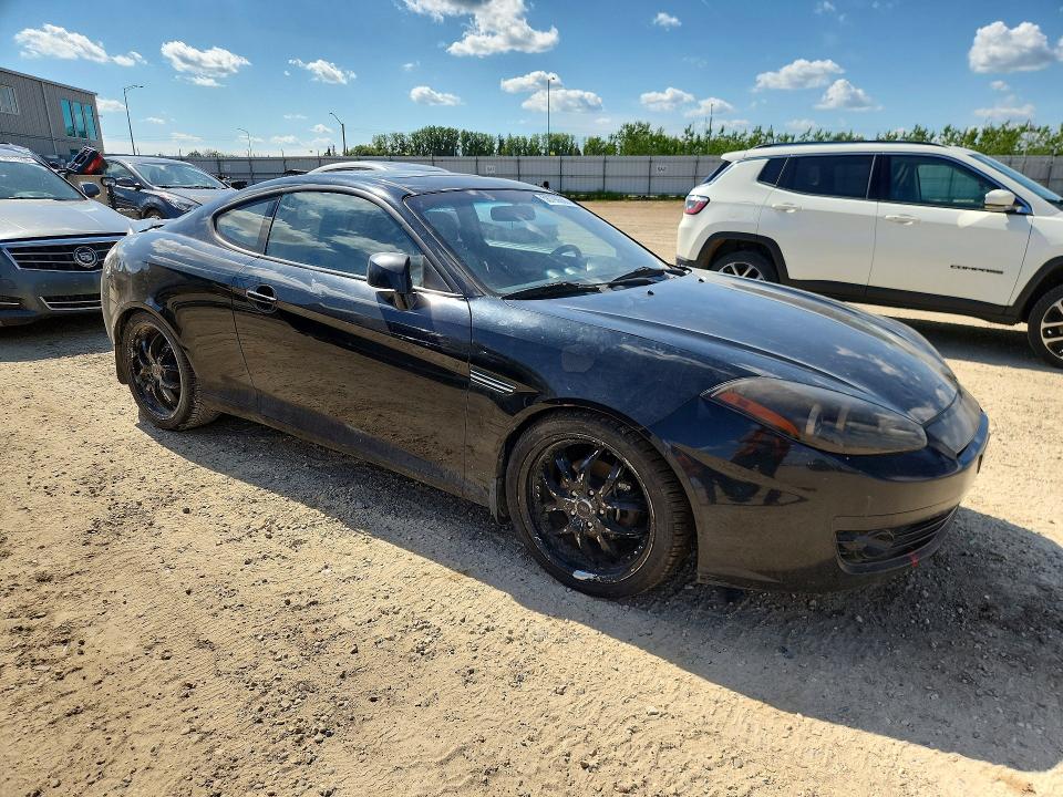 2008 Hyundai Tiburon VIN KMHHN65F78U271366 COPART salvage auction — MECHANICAL, Ab - Bos - Active, sold $450 on 2026-07-16 (photo 4)