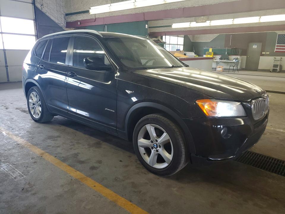 2011 BMW X3 VIN 5UXWX5C50BL700983 COPART salvage auction — MINOR DENT/SCRATCHES, In - Cert Of Title - Rebuilt Vehicl, sold $600 on 2026-07-06 (photo 4)