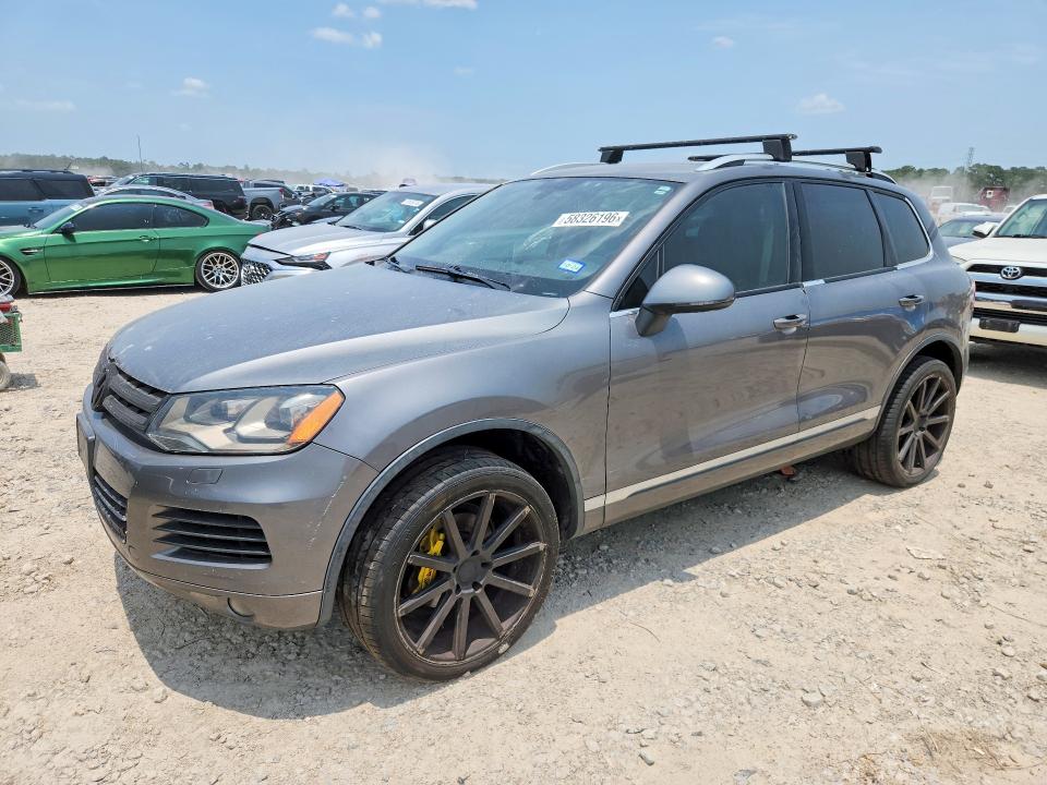 2011 Volkswagen Touareg VIN WVGFF9BP3BD001237 COPART salvage auction — MINOR DENT/SCRATCHES, Tx - Certificate Of Title, sold $750 on 2026-07-21 (photo 1)