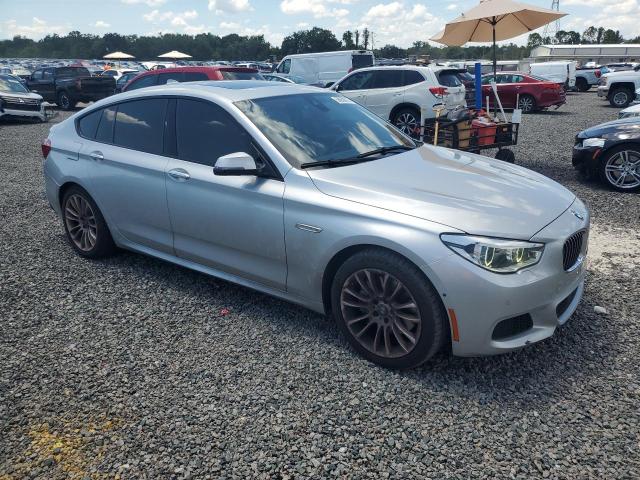 2014 BMW 5er VIN WBA5M4C50ED183342 COPART salvage auction — REAR END, Fl - Cert Of Title Slvg Rebuildable, sold $2,850 on 2026-07-17 (photo 4)