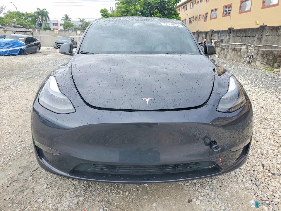 2024 Tesla VIN 7SAYGDEE5RF037184 COPART salvage auction — SIDE, Fl - Cert Of Title Slvg Rebuildable, sold $10,300 on 2026-07-28 (photo 5)