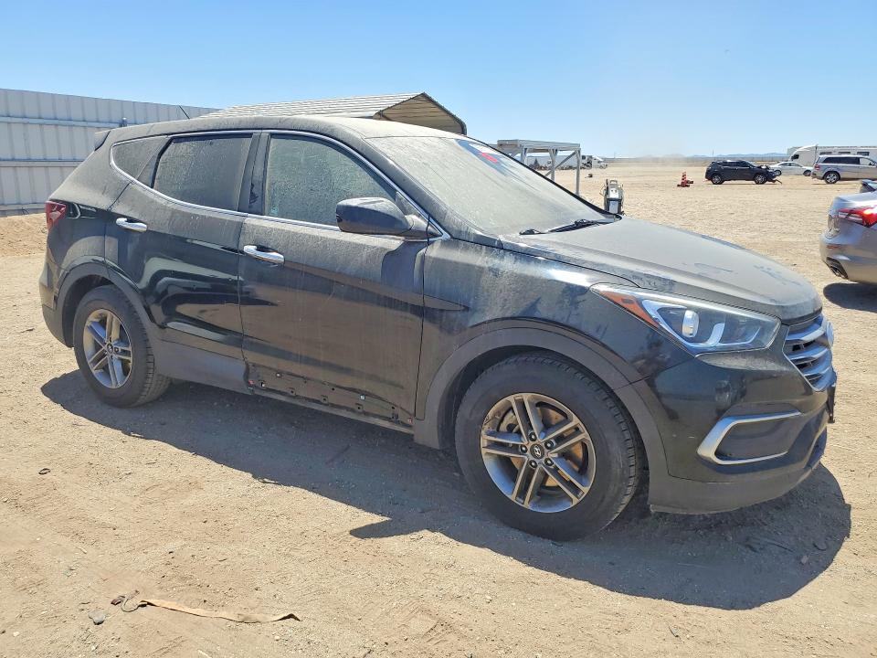 2018 Hyundai Santa fe VIN 5XYZT3LB8JG568733 COPART salvage auction — INTERIOR BURN, Ca - Dis/Dlr/Exp Only Clean Title, sold $1,500 on 2026-07-20 (photo 4)