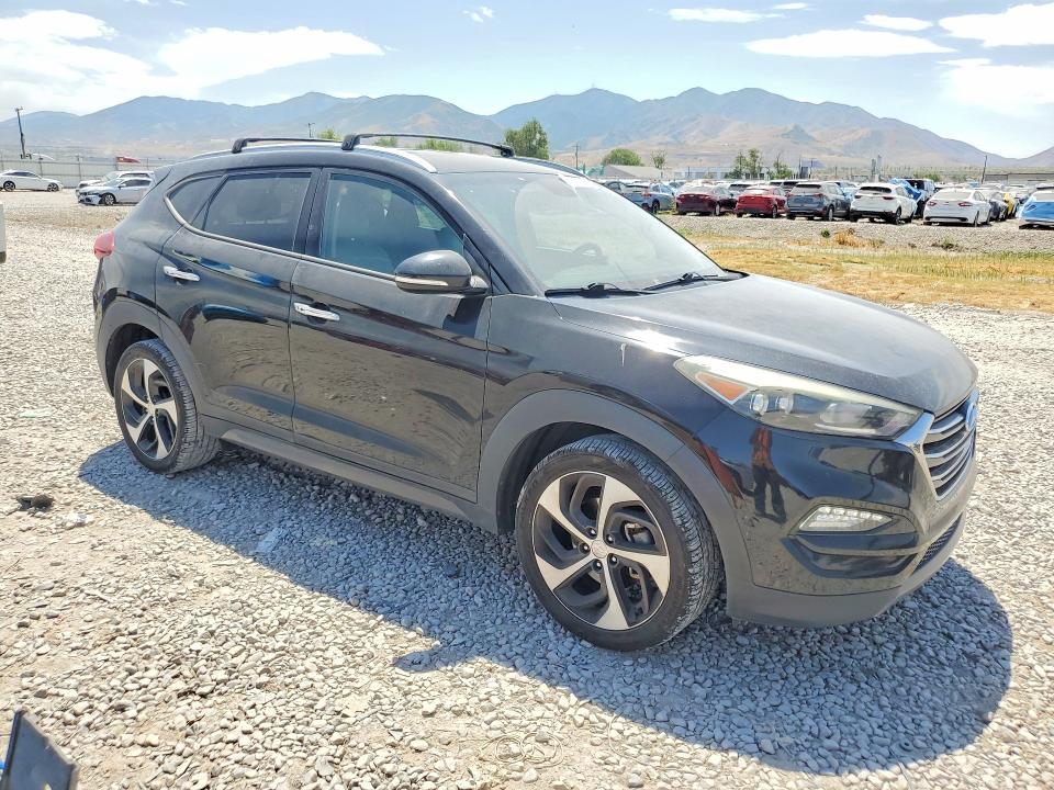 2016 Hyundai Tucson VIN KM8J33A28GU268693 COPART salvage auction — MINOR DENT/SCRATCHES, Ut - Dealer Only Clean Title (P), sold $3,250 on 2026-07-17 (photo 4)
