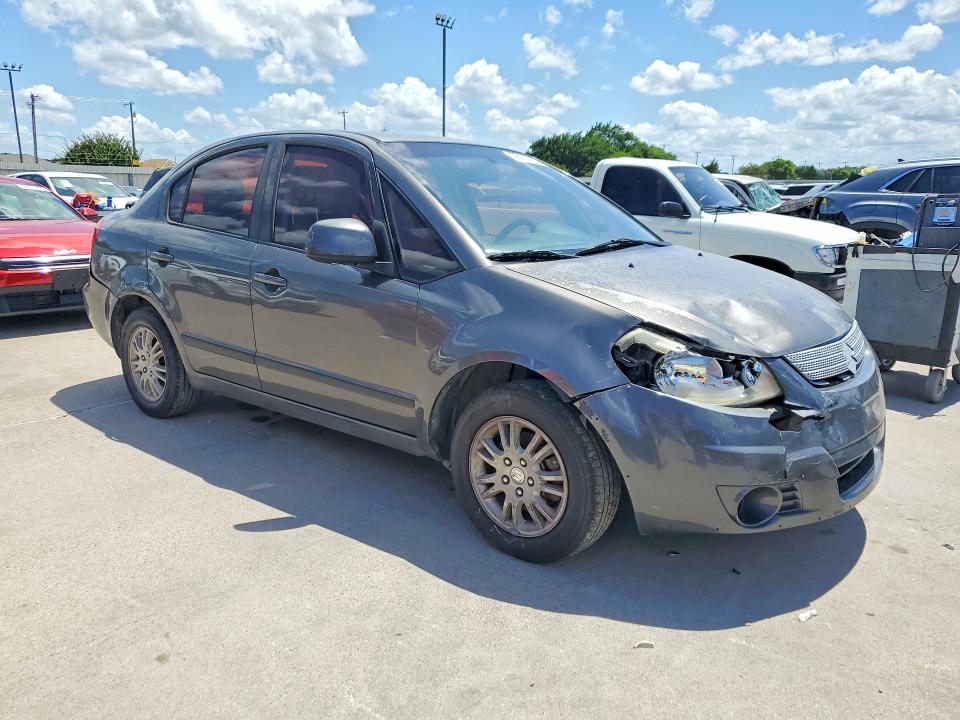 2012 Suzuki VIN JS2YC5A33C6304060 COPART salvage auction — FRONT END, TX - SALVAGE VEHICLE TITLE (P), sold $175 on 2026-07-16 (photo 4)