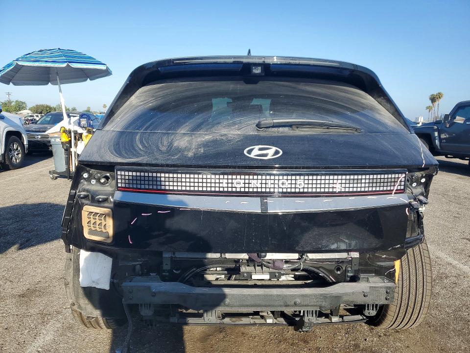 2025 Hyundai Ioniq VIN 7YAKR4DA5SY018516 COPART salvage auction — REAR END, Ca - Salvage Certificate, sold $14,500 on 2026-08-02 (photo 6)