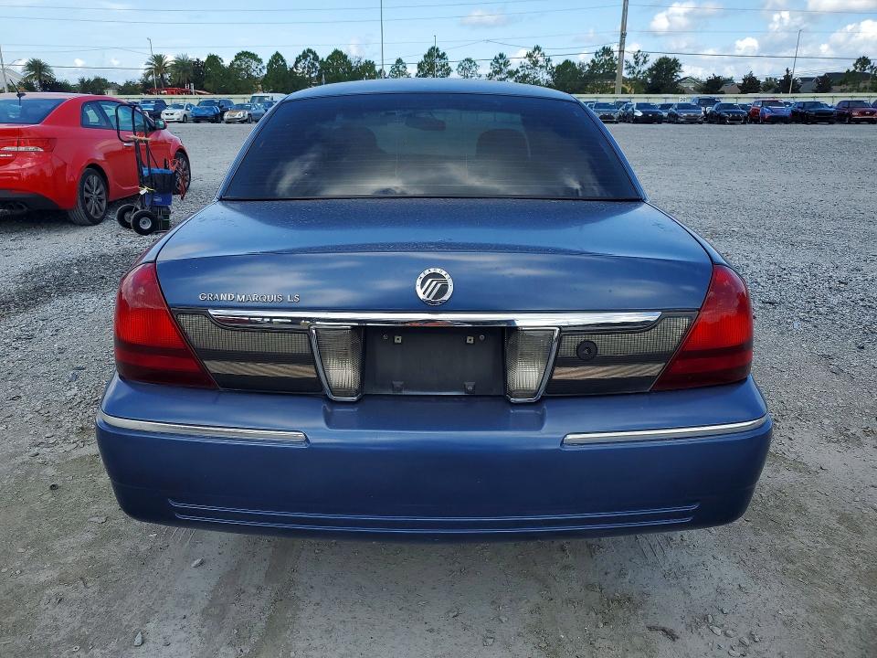 2009 Mercury Grand marquis VIN 2MEHM75V89X624386 COPART salvage auction — FRONT END, FL - CERT OF TTL-REBUILT&SLVG RBLD, sold $725 on 2026-07-10 (photo 6)