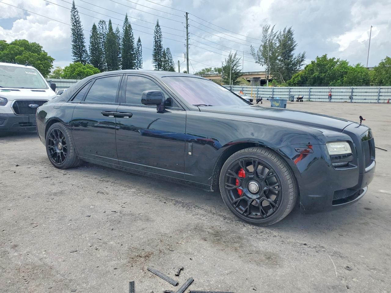 2010 Rolls-Royce Ghost VIN SCA664S55AUX48611 COPART salvage auction — Damage History, FL - CERT OF TITLE-REBUILT, sold $21,300 on 2026-07-07 (photo 4)