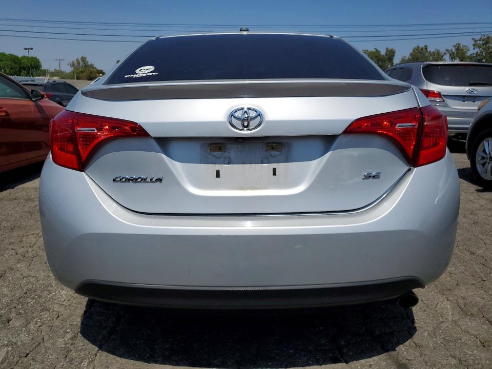 2017 Toyota Corolla VIN 5YFBURHE3HP594005 COPART salvage auction — SIDE, Salvage Title, sold $4,550 on 2026-07-16 (photo 6)