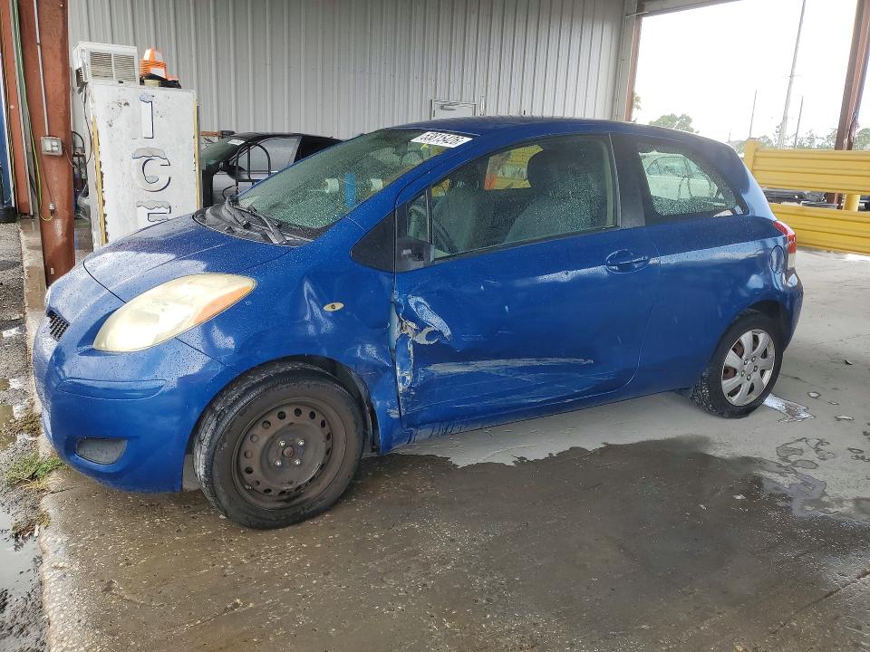 2010 Toyota Yaris VIN JTDJT4K33A5288689 COPART salvage auction — SIDE, Fl - Cert Of Title Slvg Rebuildable, sold $850 on 2026-07-06 (photo 1)